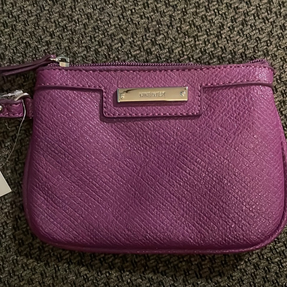 Nine West’s Glitter MOB wristlet in Muldbry MM